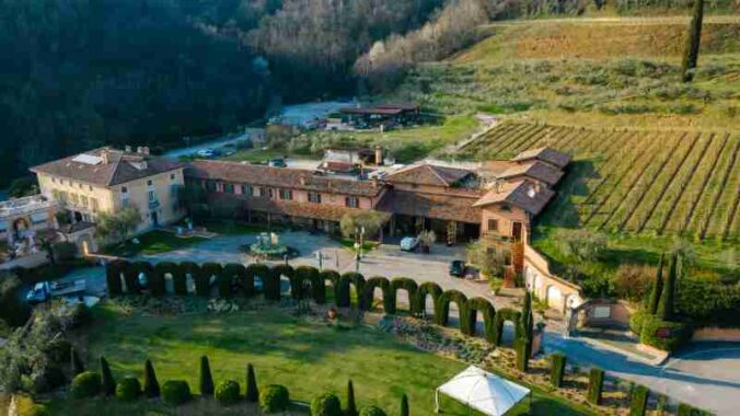Aerial view of a beautiful vineyard estate with gardens and hills in Tuscany., tags: la campagna - pexel